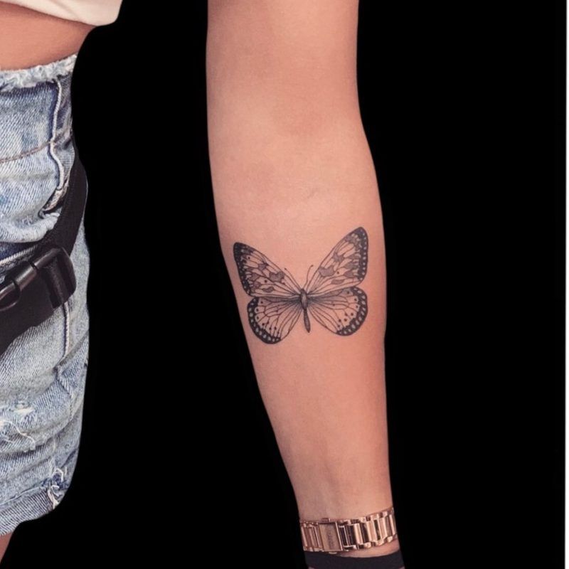 fine line tattoo mariposa