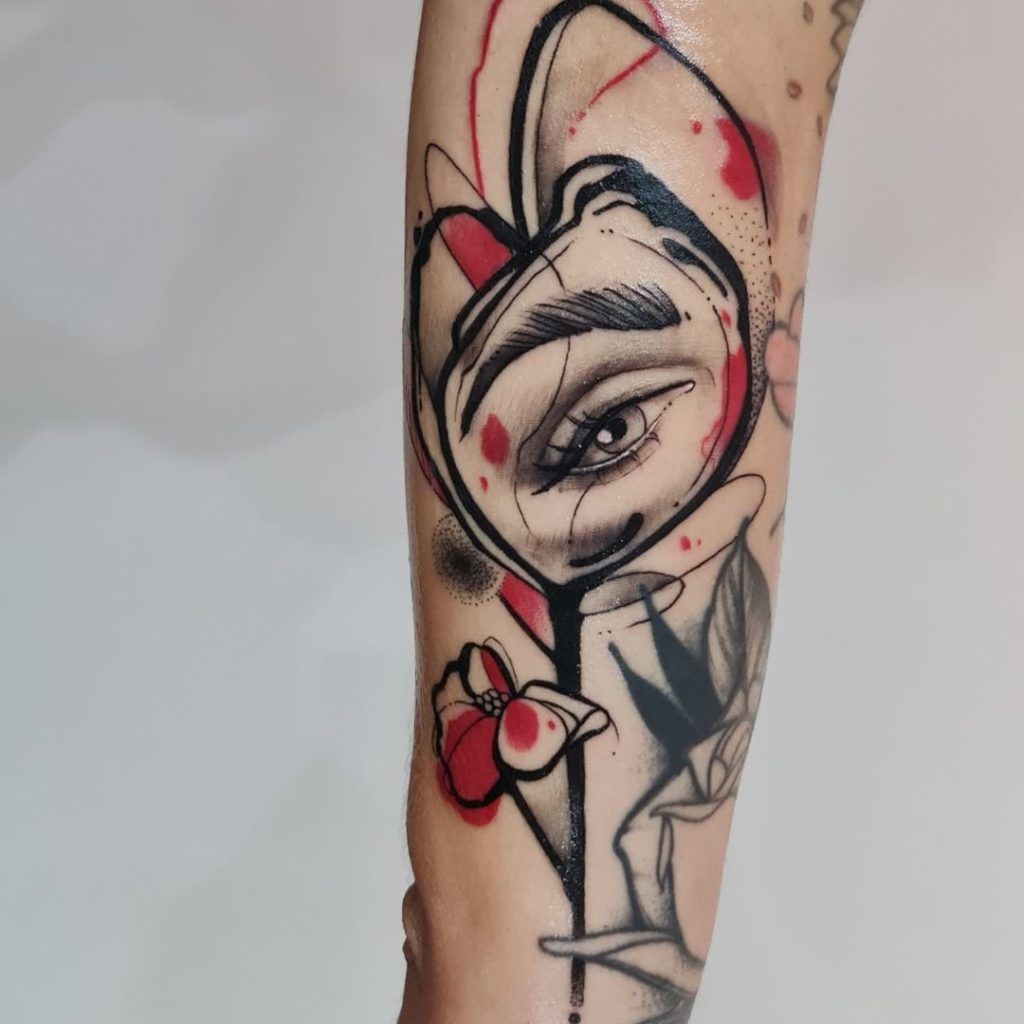 tattoo flor y ojo